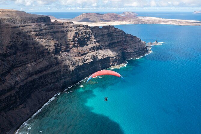 DISCOVERY FLIGHT tandem paragliding Lanzarote with pro pilot - The Aerial Route Over Lanzarote: Ocean, Lava Fields, and Volcanic Views