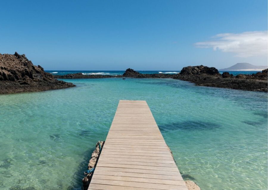 From Lanzarote: Lobos Island and Fuerteventura Day Cruise - Snorkeling, kayaking, and paddle-surf style time: plan for wet fun