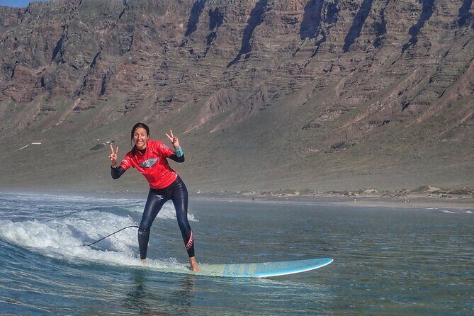 Group Longboard Surf Lesson in Lanzarote - Soft Boards to Hard Boards: The Confidence Ladder
