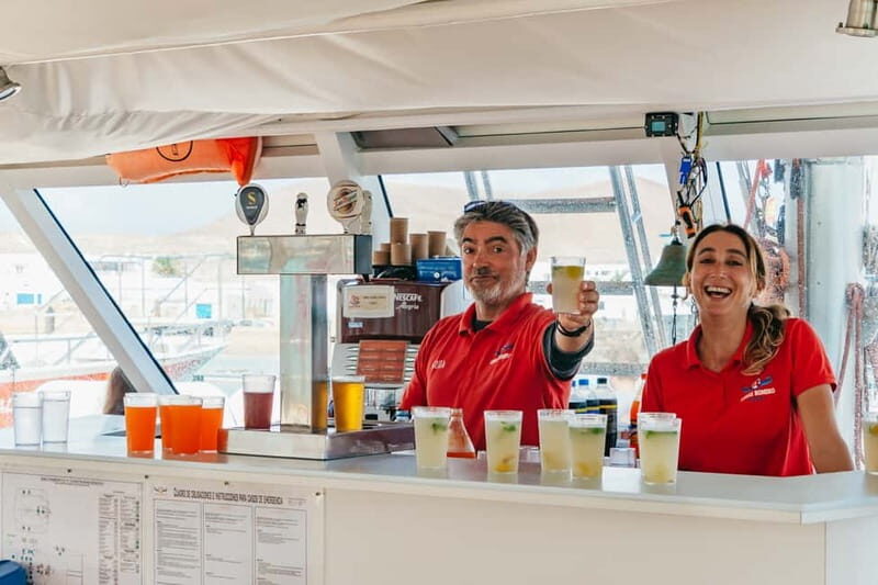 La Graciosa: Island Cruise with Lunch and Water Activities - The Onboard Lunch Moment: Paella, Fruit, and Unlimited Drinks