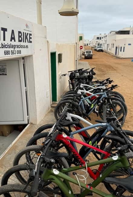 La Graciosa: Rent your ELECTRIC BIKE and explore the island at your own pace. - Finding your bikes: the WhatsApp/text pickup moment that sets the tone