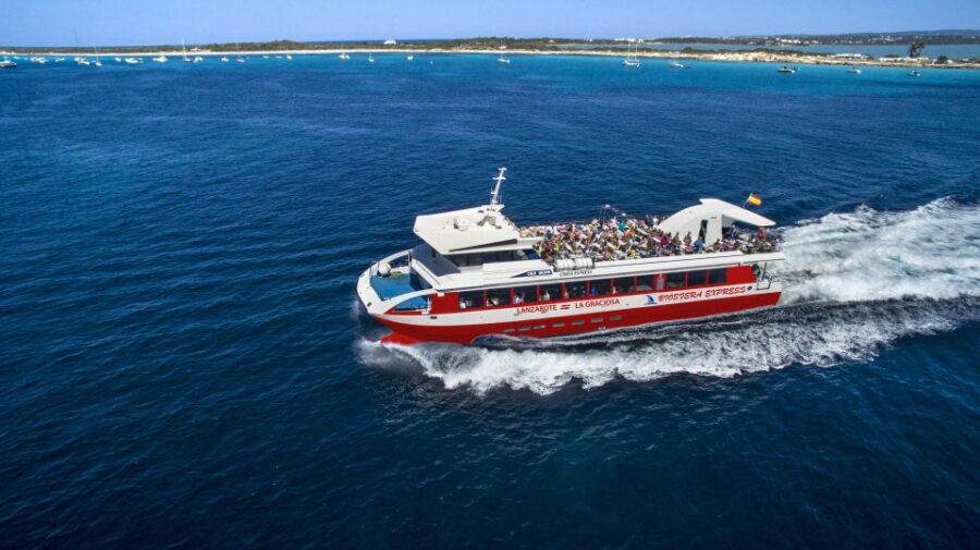 Lanzarote Coast to Coast Tour - Guided church stop, lunch by the dock, and paella with drinks