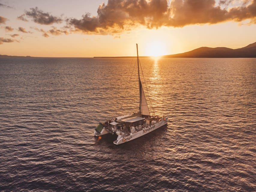 Lanzarote: Dolphin-Watching Sunset Cruise with Transfers - On deck with a welcome mojito: how the cruise pacing feels