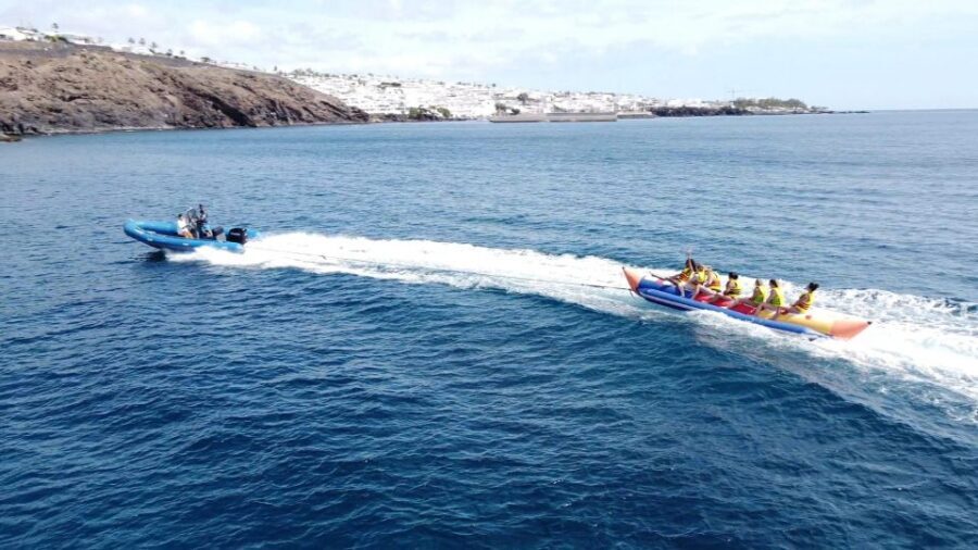 Puerto del Carmen: Catamaran Trip with Water Sports - The Catamaran Ride Part: Snacks, Drinks, and Unhurried Views